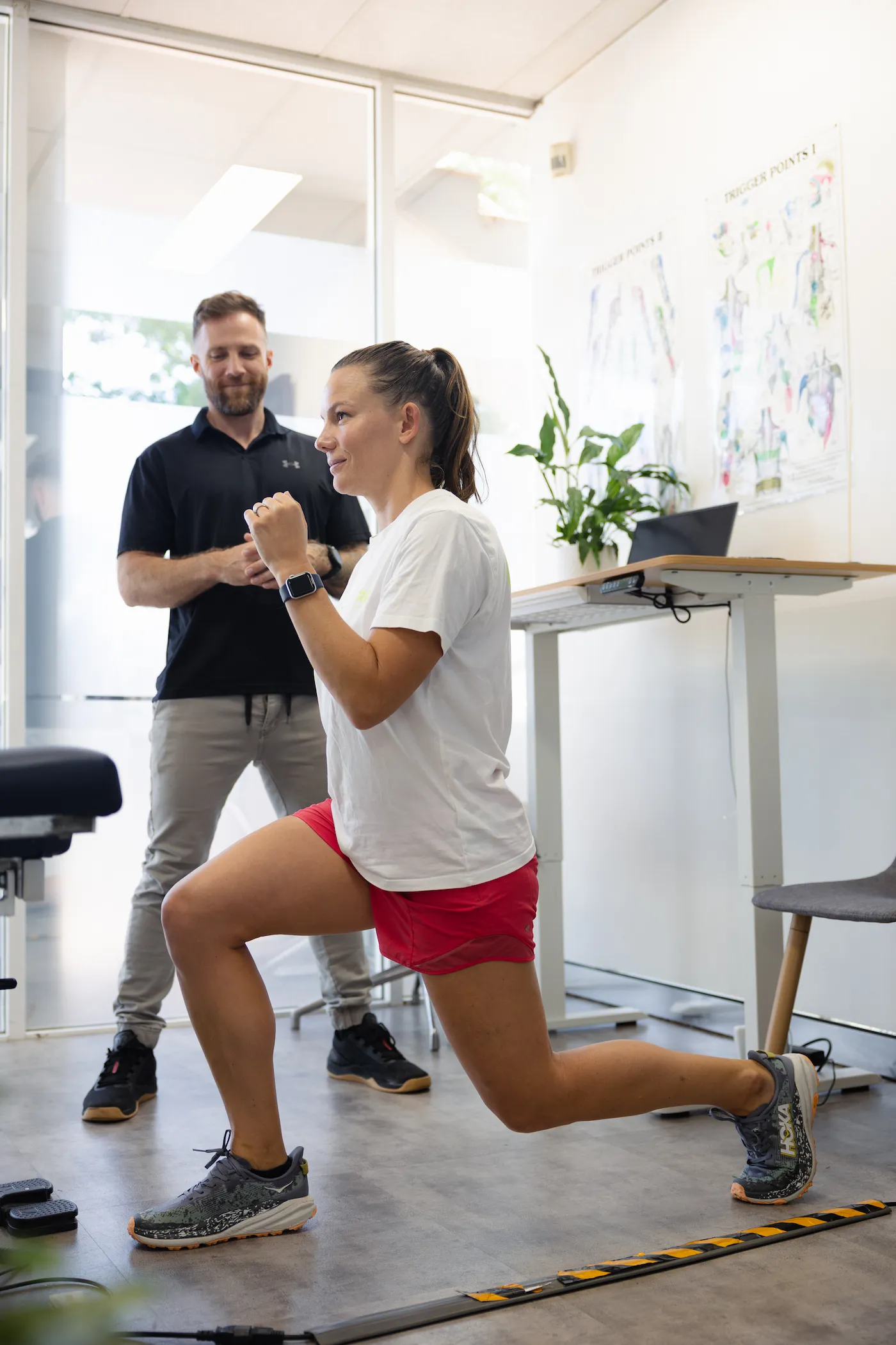 Chiropractor teaching patient how to lunge correctly Balgowlah and Mona Vale