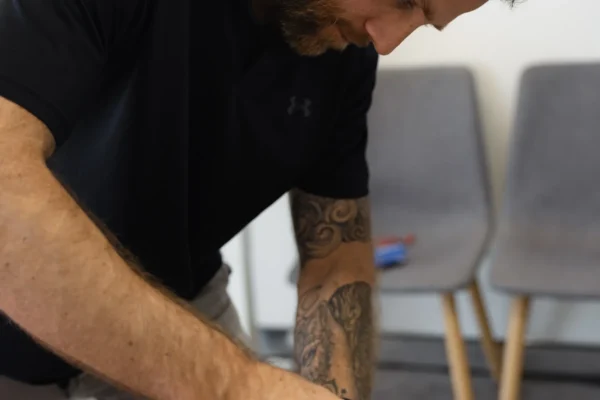 Chiropractor performing dry needling in Mona Vale